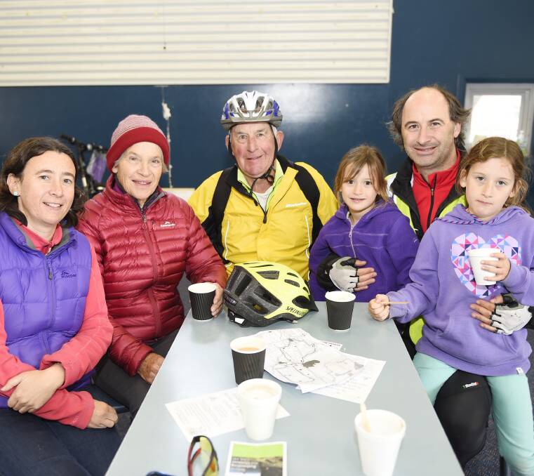 Rugging up: Jacqui, Wendy, John, Hannah, 6, Phil and Hayley Wilson, 8, at the finish line of the Ballarat Autumn Day Ride 2016. Picture: Luka Kauzlaric