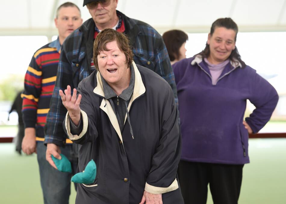 Bowled over: Libby Siebers takes part in a free bowls day at Sebastopol Bowling Club at the launch of the Score! website. Picture: Kate Healy