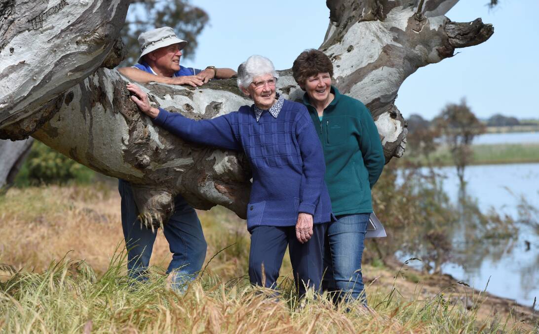 Enough's enough: Friends of Lake Burrumbeet volunteers John Gregurke, Margaret Moodie and Susan Moodie. The Friends have put in thousands of hours removing weeds and litter at the lake over the years. Picture: Lachlan Bence