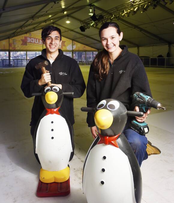 Feel the chill: Stars On Ice customer service worker Francis Martin and manager Gabby Aston as the rink starts to take form ahead of the Winterlude festival. Picture: Luka Kauzlaric
