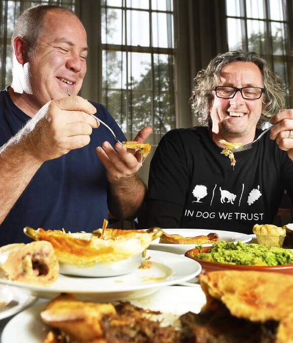 The pies have it: Fairfax food critic Richard Cornish and local food expert Peter Ford judging pies as part of Winterlude's annual Pie and Pale competition, which has run for the past month. Picture: Luka Kauzlaric