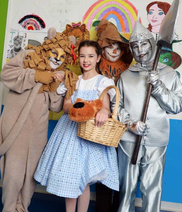 FOLLOW THE YELLOW BRICK ROAD: Soren Andrews (the Lion), Laura Geddes (Dorothy), Zac McGuinness (Scarecrow) and Liam Algie (the Tin Man) ready for the Miners Rest Primary School musical. Picture: Kate Healy