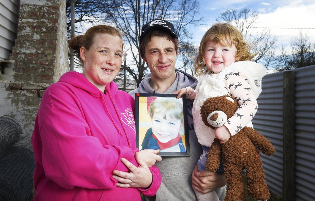 LOVING MEMORIES: Kathryn Brown, Thomas Huby and Monique Huby want to build a memorial garden to remember their daughter and sister Isabella. Picture: Luka Kauzlaric