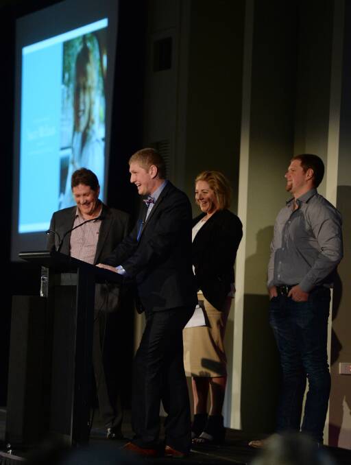 LOVELY MEMORIES: Sally McLean's family, from left, husband Ray, daughter Courtney, son Jesse (speaking) and son Jackson celebrate her life. Picture: KATE HEALY