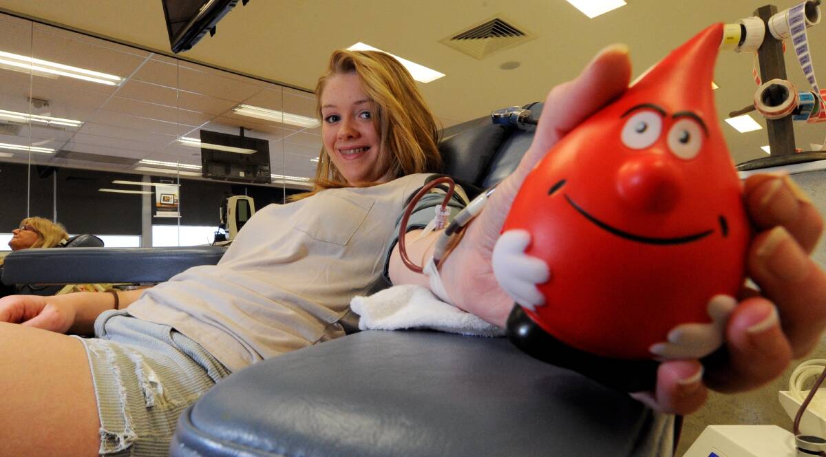 GOOD CAUSE: Zoe Mayberry gives blood at the Ballarat Blood Donor Centre.The Australian Red Cross Service is calling for new donors due to the Australia Day holiday.