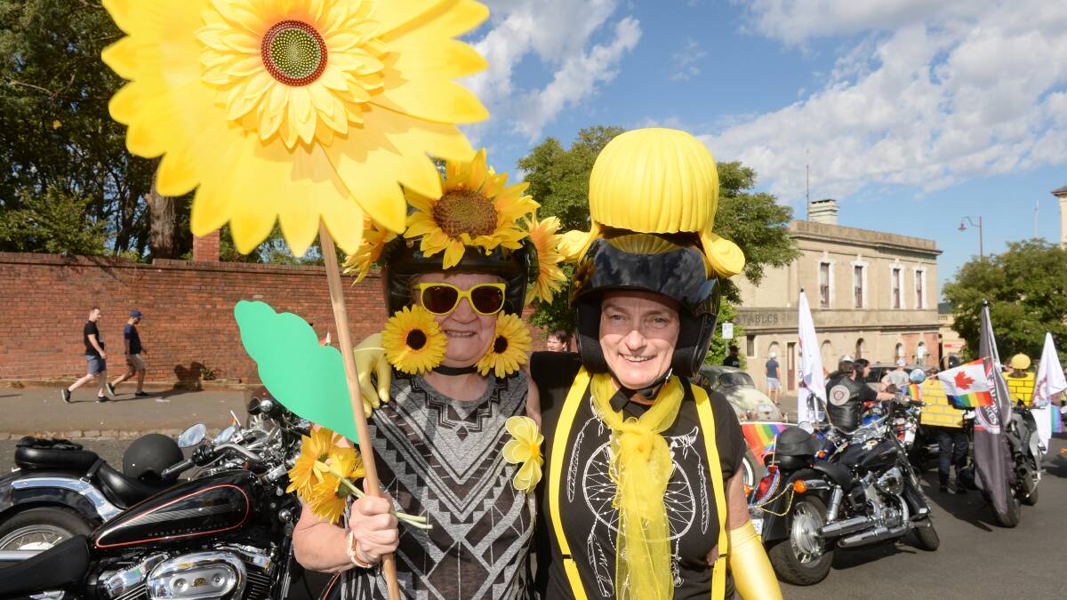 MELLOW YELLOW: Di Dean and Mez Handcock of Melbourne brought their bikes and a sunflower yellow theme to the ChillOut Festival parade. Picture: Kate Healy