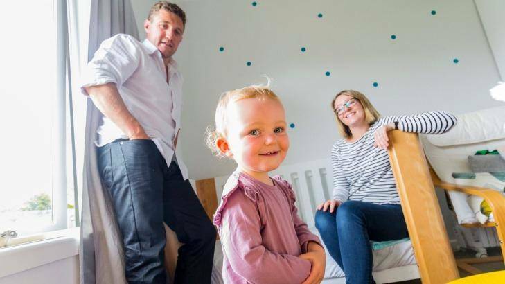 Anna, 2, pictured with parents Paul McMullen and Penny France, cannot gain access to Kalydeco, which will greatly improve her quality of life. Photo: Chris Hopkins
