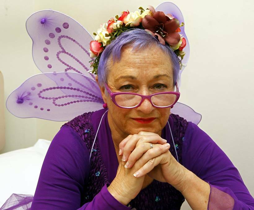 Behind the fairy wings and coloured hair is an experienced health professional who is equally at home in an emergency department or up in the air with the Royal Flying Doctor Service. Picture: Les Smith.