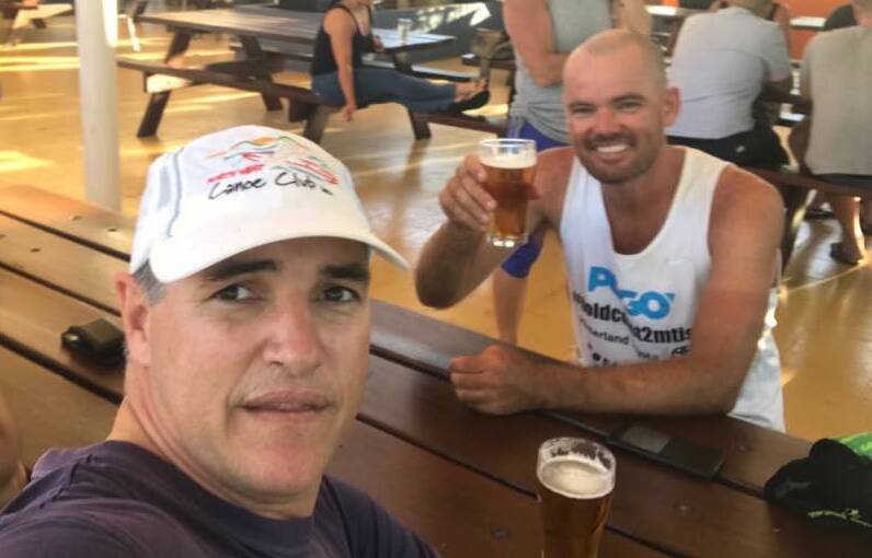 Robbie Katter MP (centre) with Doug Black after his epic journey to Mount Isa. Photo: Facebook