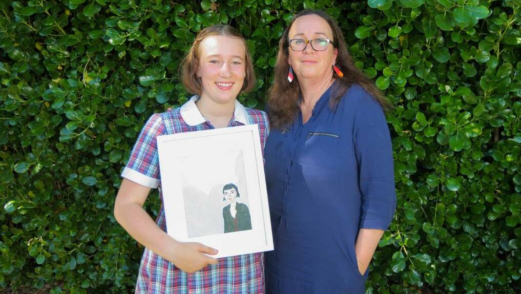 Davida Melis-Sharp, 14, and her mother, Tamara Sharp, embraced the opportunity to showcase work in a women's art prize. Picture: Morgan Hancock