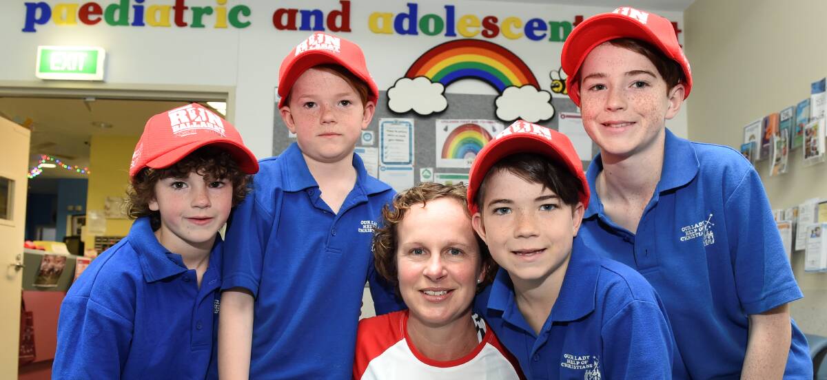 SUPPORTIVE: The Martin siblings from left, Archer, 6, Hunter, 8, Isaac, 10, and Fletcher, 12, with BHS nurse Sally Coutts. Picture: Lachlan Bence 
