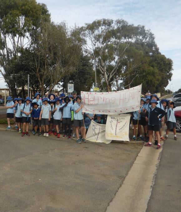EFFORT: Lumen Christi Primary School pupils have raised $3000 for Caritas Australia’s appeal, Project Compassion, through an annual walkathon.