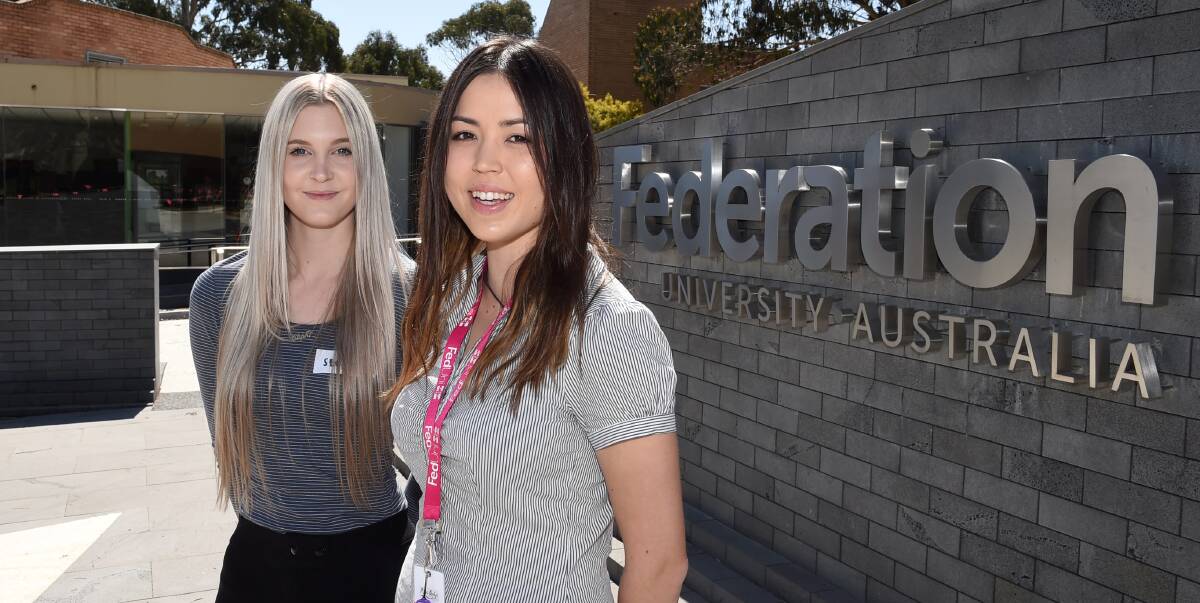 BIG PLANS: Final-year education students Steph Harper and Jody Dontje plan to start their first job as graduate teachers in London. Picture: Lachlan Bence