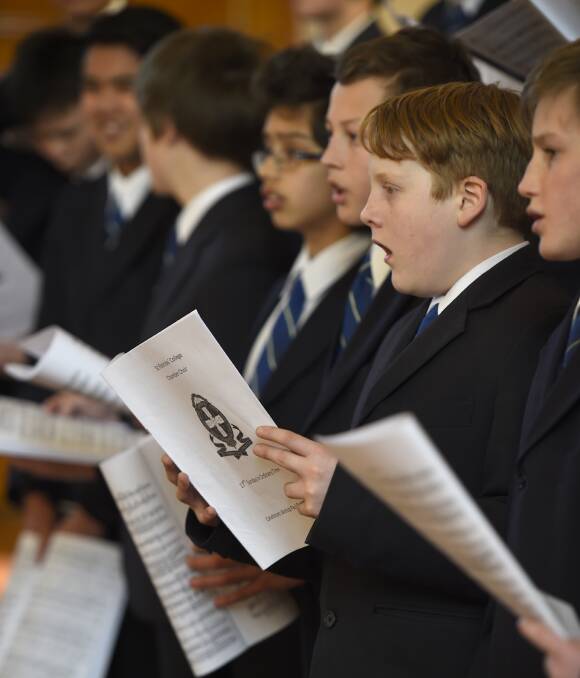 IN-TUNE: Brandon Moore-Tyre rehearses with the St Patrick's College Junior Chamber Choir. Picture: Luka Kauzlaric