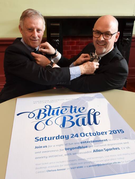 SUPPORT: Ballarat Mayor John Philips and Federation University Australia campus life director Colin Marshall launch the university's Blue Tie Ball. Picture: Lachlan Bence
