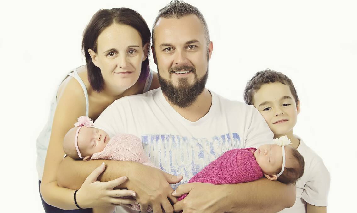 HEARTBREAK: Erin pictured just before her death with husband Adam, son Jack and newborn twins Jorja and Charli. Her mother-in-law Kellie Hackney has planned a benefit night to help support the family.