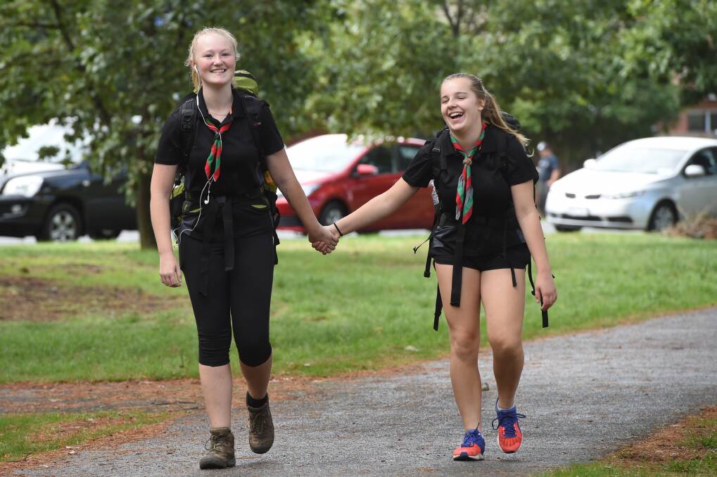 WALKING TOGETHER: Emma Baker, 14, and Maya Mitrovic, 13, complete a lap of Victoria Park. Picture: Kate Healy