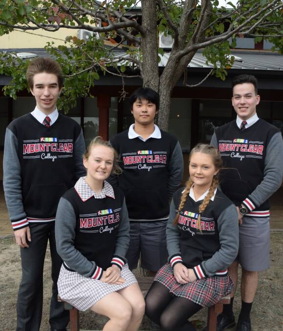 TOP WORK: Mount Clear College students (back from left) Liam Berrigan, 16, Henry Zhang, 17, Scott Walker, 17, Genevieve Zaltkovic, 17, and Marlee Page, 17, will benefit form a budget education blitz. Picture: Olivia Shying 