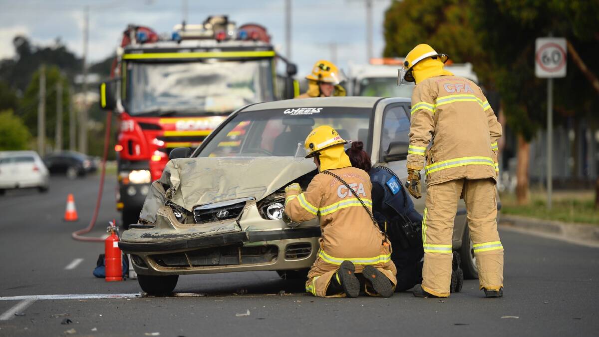 Emergency services at the scene of the two car crash. Picture: Dylan Burns
