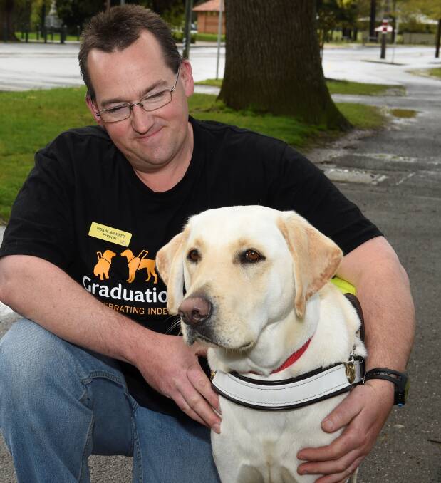 LIFE CHANGING: Mathew Jones and his dog Petros will be better off under the NDIS scheme. Picture: Lachlan Bence