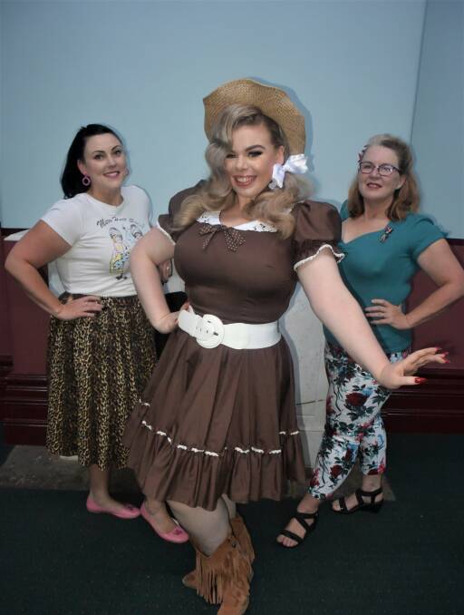 CONFIDENCE BOOSTER: (From left) Amanda Rush, pin-up competitor Jessi Leigh and organiser Tracey Spencer get ready for the Ballarat Beat Rockabilly Pin-up competition. 