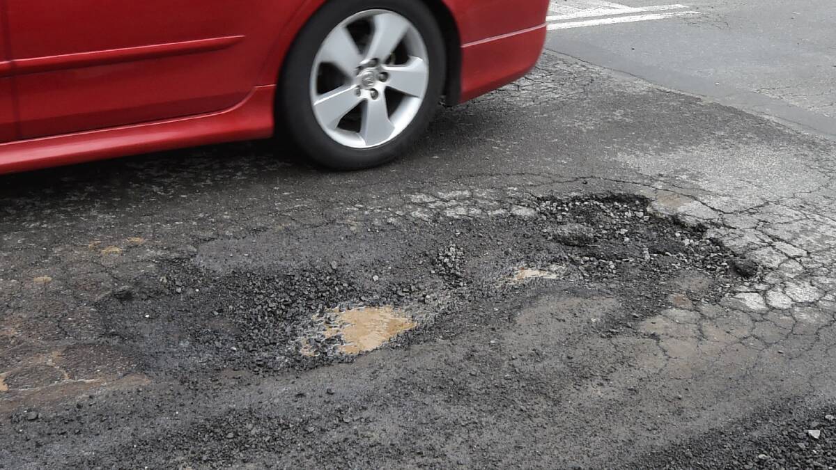 Driver warns hefty pothole crash costs