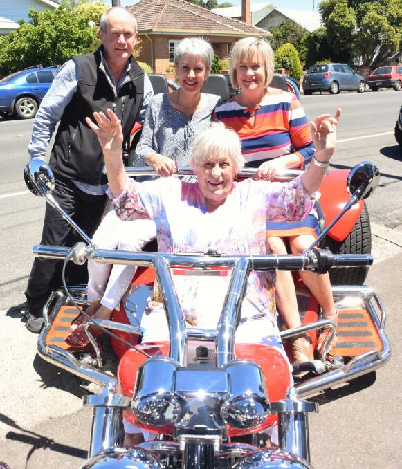 ROARING NINETIES: (back from left) Mark Leverett, Jan Leverett and Ann Robson surprised their mum Betty Leverett on her ninetieth birthday with a bike ride. 