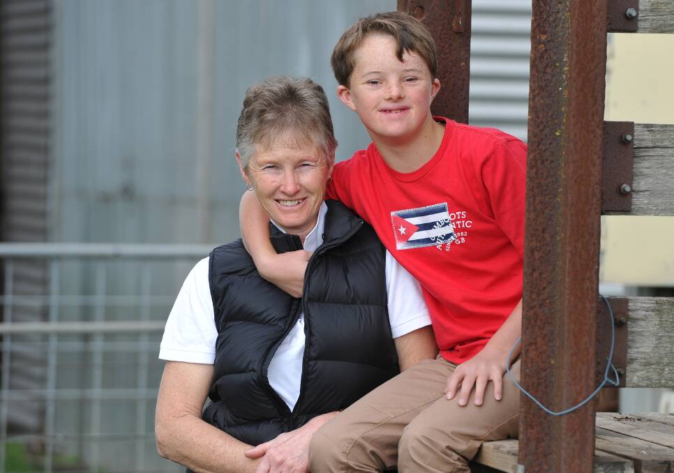 LEARNING TOGETHER: Wendy McNabb and her son James McNabb are both keen golfers. Picture: Lachlan Bence