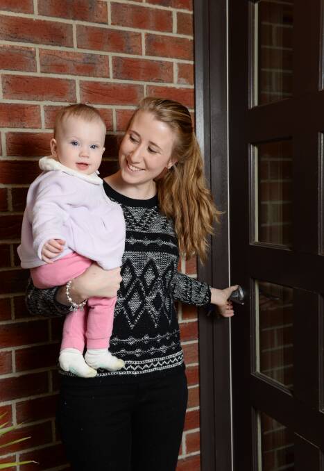 TIME TO BUY: Jessica Hayes says low interest rates mean her family, including daughter Maddison Manton, 9 months, can finally plunge into the property market. 