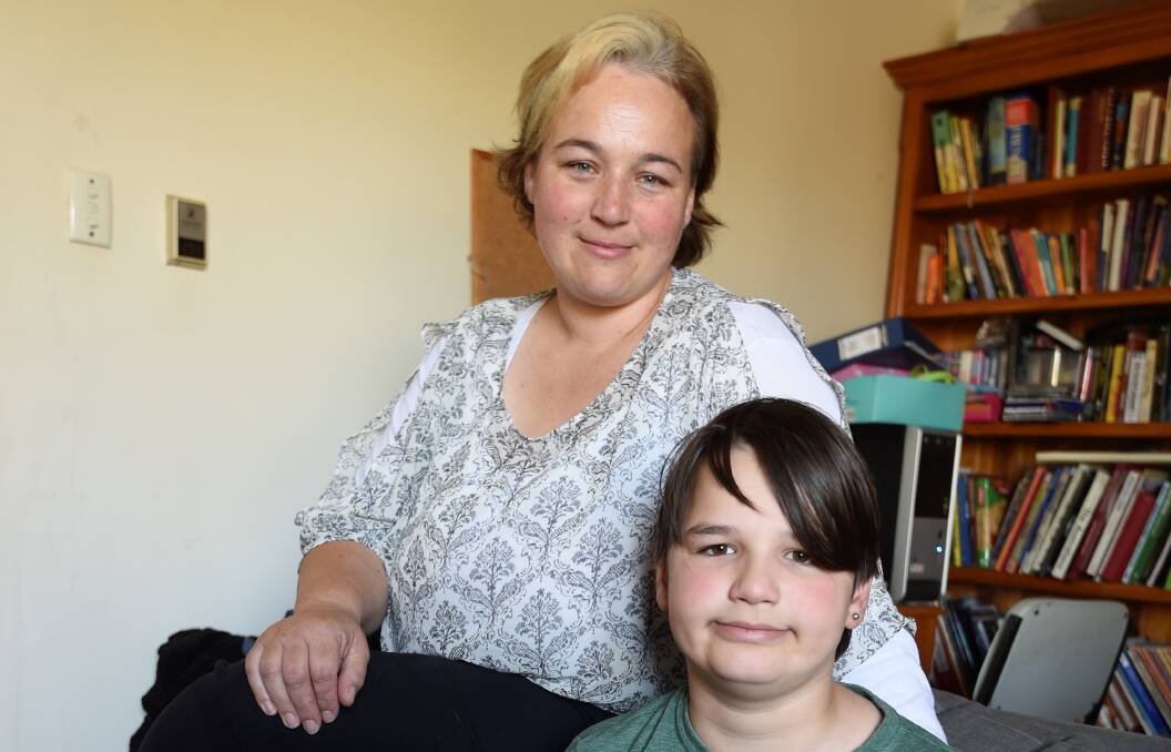FUNDING BID: Tammy Hammond and her son Alex, 14, are desperate for five day a week aide so Alex can attend full time school. Picture: Lachlan Bence 