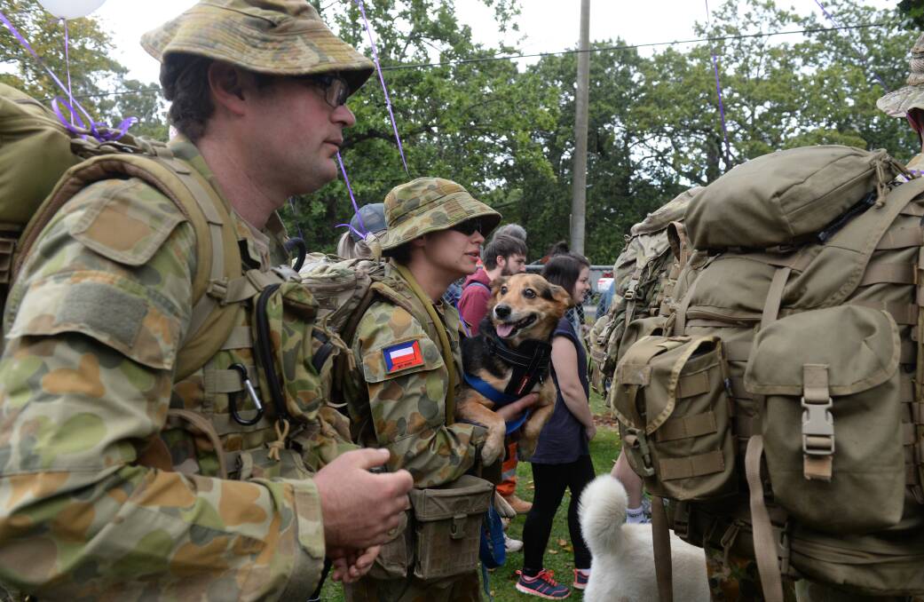 WALKING AS ONE: A crowd gathers to rally support for awareness of PTSD. Picture: Kate Healy