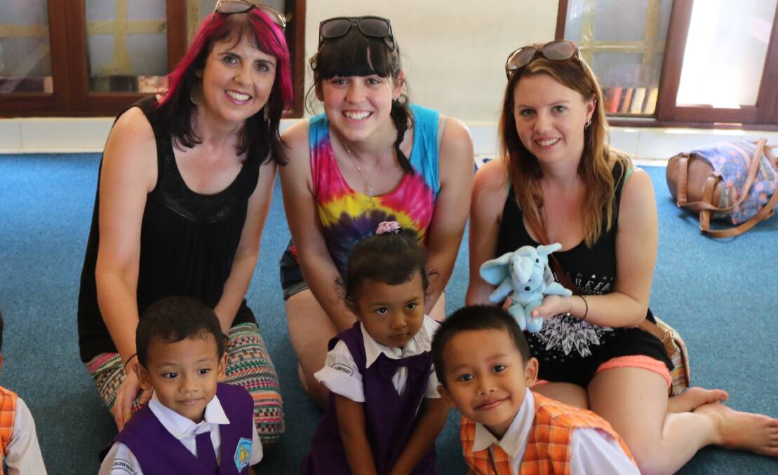 NEW RESOURCES: Children educated through The Bali Children's project play with their new resources donated by Jodi Dorney, Chloe Waddell and Stacey Corney. 
