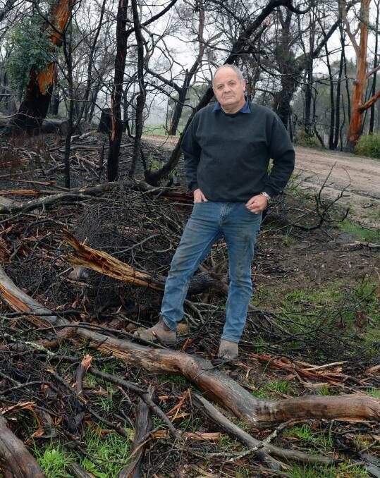 RELIEVED: Resident Stephen Hodgetts is glad Ballarat City Council has promised to remove a build up of fire debris scattered along roads. Picture: Kate Healy 