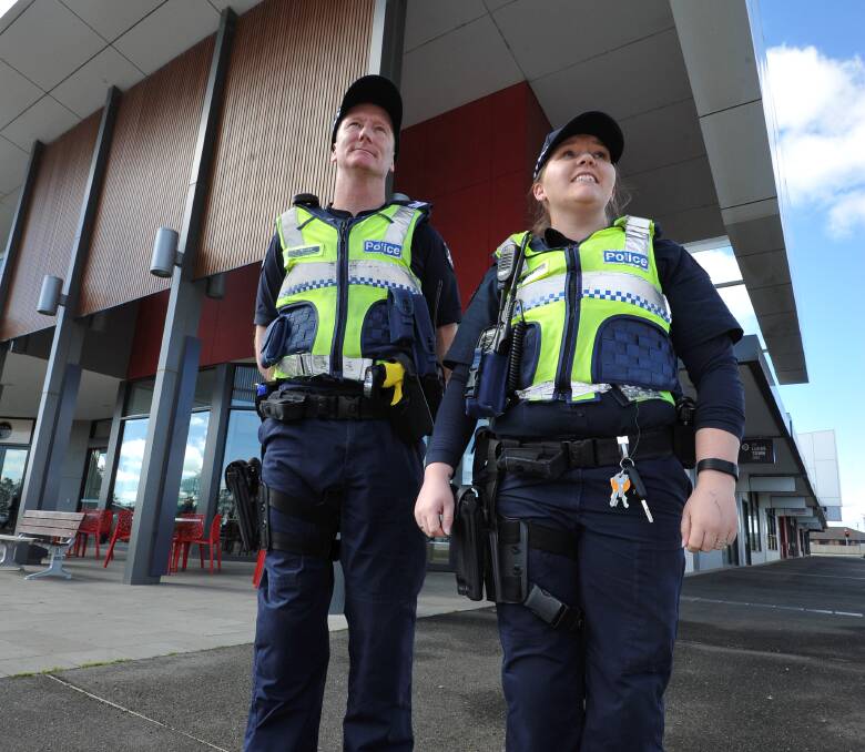 PATROLLING: Senior Constable Peter Brown and Senior Constable Kate Porter patrol Lucas Shopping Centre. Picture: Lachlan Bence 