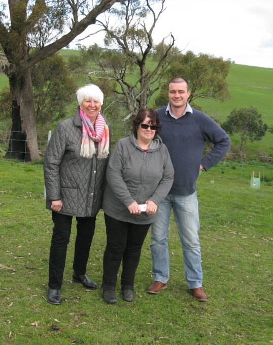 NEW TREES: Chair of the Corangamite CMA Alice Knight, Property Owner Marie Ford  and Landcare Coordinator Nick McKinley look at the growth. 