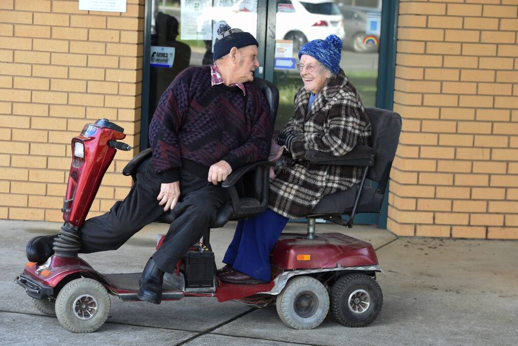 INDEPENDENT: Robert Carpenter and Joyce Bourke go for a scoot in their tandem mobility scooter. Picture: Lachlan Bence 