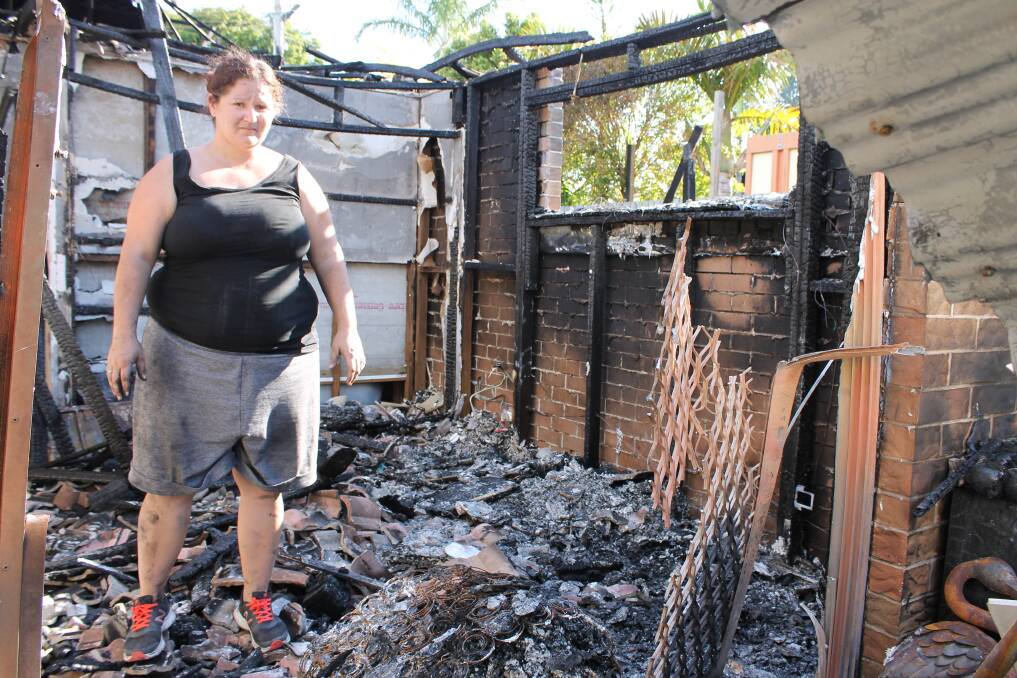 DESTROYED: Alex Turner in her bedroom where the fire started. Fire investigators believe the fire was caused by an electrical fault. Photo: Cheryl Goodenough