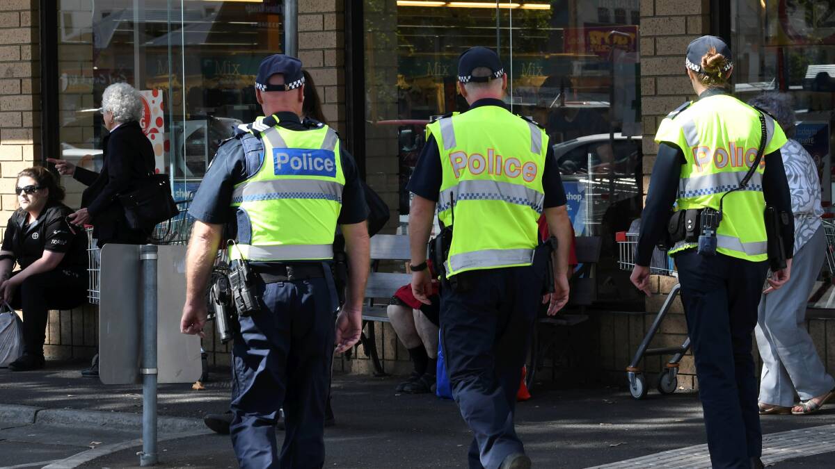 Police patrol at the Little Bridge Street car park this week. Picture: Lachlan Bence