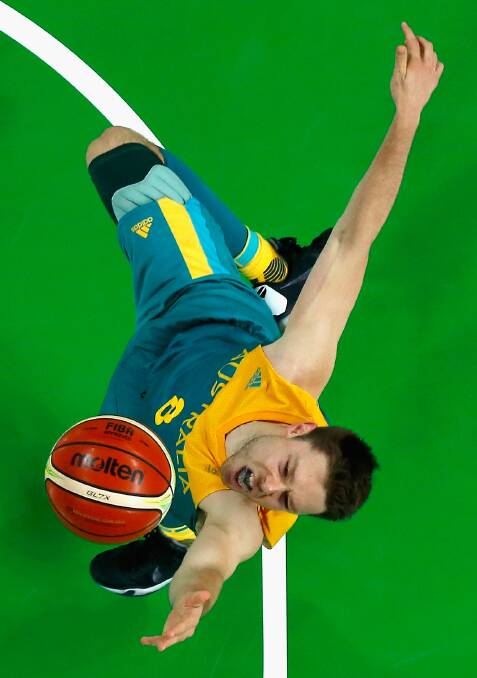 RIO DE JANEIRO: Matthew Dellavedova shoots the ball during the Men's Basketball preliminary round Pool A game against Serbia on Day 3. Picture: Getty Images