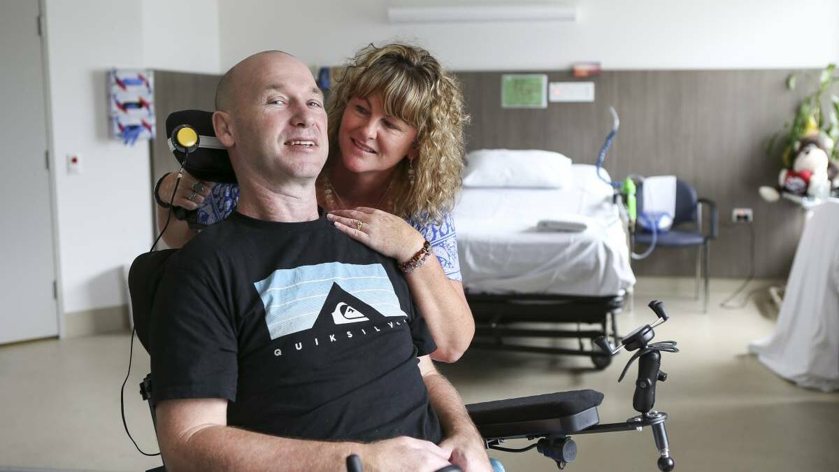Troy Miles with wife Nicole in Royal Rehab Ryde. Miles became a quadriplegic after a motorcycle accident last year. Picture: Katherine Griffiths