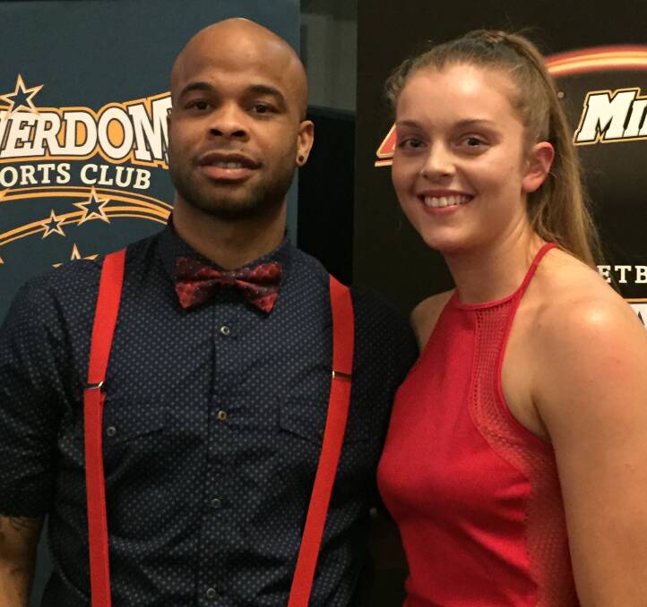 BEST: Miners showman Roy Booker and consistent performer Abbey Wehrung celebrate team MVP honours in Basketball Ballarat's awards dinner on Sunday night.