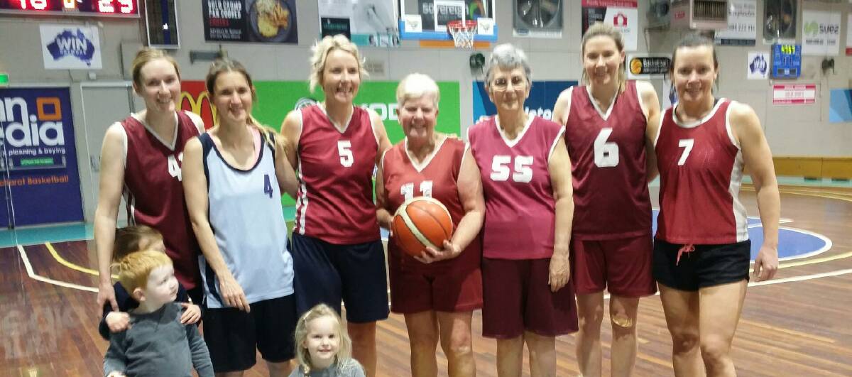 ACTIVE: Hawks' Helen Rieniets, centre with the ball, celebrates her 70th birthday this week with her basketball teammates at the Minerdome.