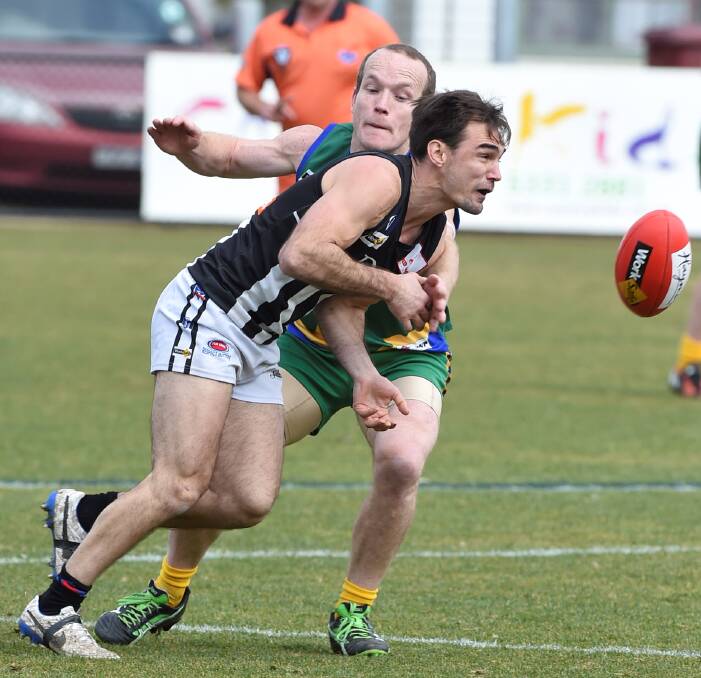 PRESSURE: Laker Steve Clifton locks down on Darley's Anthony Chiu. This time, a match with the Devils was all on Lake Wendouree's terms - and the Devils felt the pinch. Picture: Lachlan Bence
