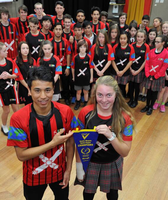 SCHOOL PRIDE: Mount Clear College soccer captains Ibrahim Ghulami (senior boys) and Jane Pert (junior girls) lead a booming new sports program that is commanding attention. Picture: Lachlan Bence