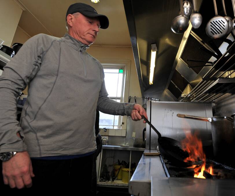 PRIDE: The Avoca owner Ian Urquhart fires up the kitchen earlier this year. The hotel won the Golden Plate for best venue statewide. Picture: Lachlan Bence