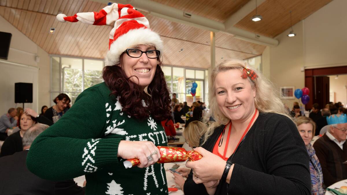 JOYFUL: Mel Lerpiniere-Tunn and Kerrie Sharrock at Federation University's Christmas in July Appeal luncheon. Picture: Kate Healy