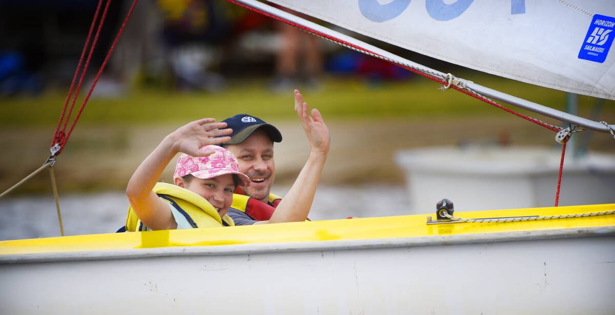 FUN DAY OUT: Andrew and Amelia Strait, 10, at the Ballarat Yacht Club discover day sailing on Lake Wendouree. Picture: Luka Kauzlaric