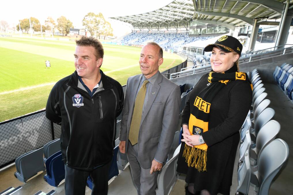 FIRED UP: AFL Goldfields general manager Rod Ward, Buninyong MP Geoff Howard and Wendouree MP Sharon Knight get ready for an AFL grand final eve festival at Mars Stadium. Picture: Lachlan Bence