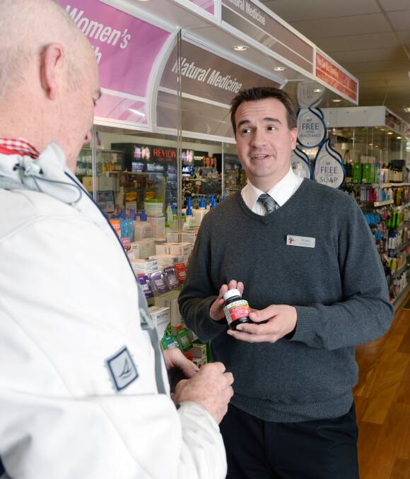 ADDED CARE: UFS pharmacists like Timothy John will soon be able to offer customers advice and health care round-the-clock from the Sturt Street store. Picture: Kate Healy