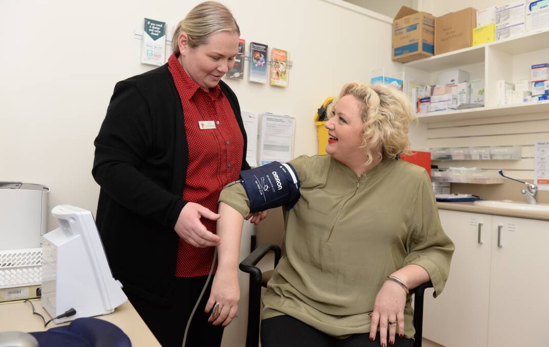 Victorian Health Minister Jill Hennessy gets her blood pressure checked at the opening of the Sturt Street superclinic last year. Picture: Kate Healy